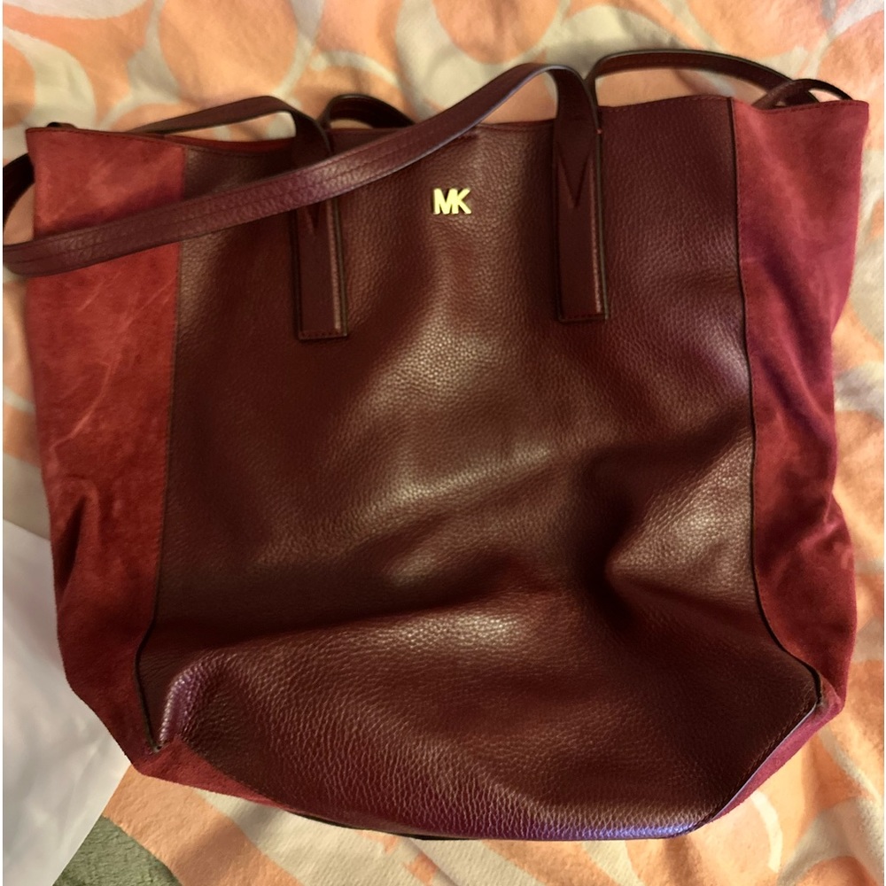 Authentic Michael Kors leather and side tote